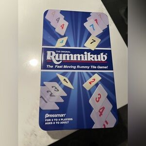 NWOT rummikub set. Opened and never used. This is a mini set (see tiles photo)